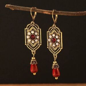 Elegant Gold and Red Dangle Earrings